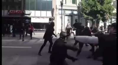 Man blocks steel baton swing and knocks out attacker, kinda insane