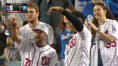 Juan Soto imitates Trea Turner's speed with his fingers.