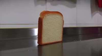 Piece of bread falling over