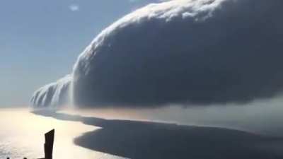 A beautiful roll cloud over Lake Michigan immortalized by Ken Temple