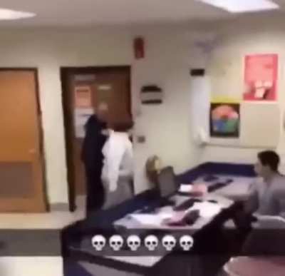 Kid destroying classroom before being subdued by classmate