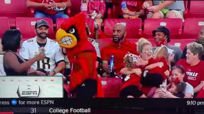 Kids get scared by Louie, the Louisville Cardinal Bird.