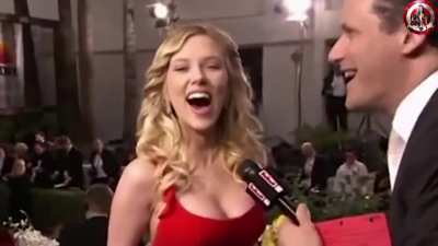 Interviewer feeling up a woman