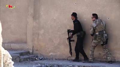 American AH-64 Apache and SDF forces engaging ISIS forces in a failed prison break attempt in Northeasten Syria