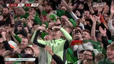Irish fans erupt in cheers as Ronaldo is given a red card