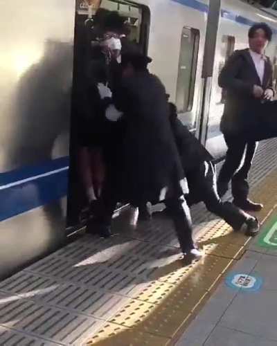 This is real. I have experienced being in trains this stuffed in Tokyo. Happens every day. Especially during rush hours. Quite interesting experience.