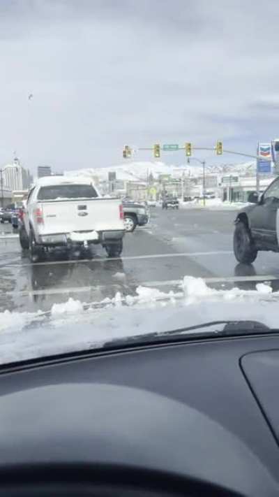 Truck driver brakes late and slides into an intersection. Rather than reverse into his empty lane so the 6 lanes of traffic in front of him can drive freely, he just…keeps…going… Bonus: vestigial windshield wipers.