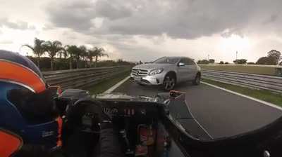 Lost driver blocks pit lane exit during race at Interlagos, Brazil.