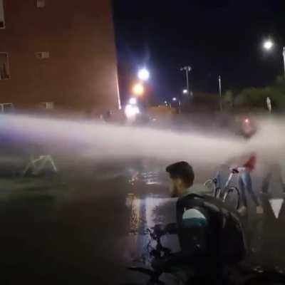 Protester gets hosed