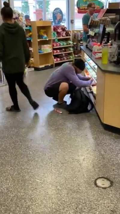 Dude wiping out the Wawa candy supply