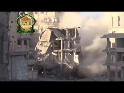 Opposition engineers appear to underestimate their explosive needs while detonating a tunnel bomb underneath SAA controlled buildings - Al-Malihah - 1/24/2014