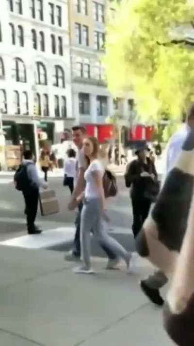 Another Karen freaks out, spitting on a street food person.