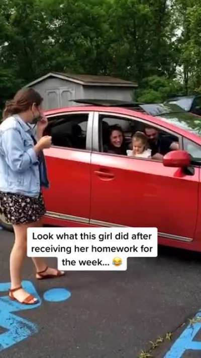 This little girls priceless reaction on getting homework for the week.