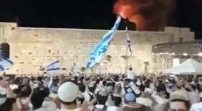 Israeli people celebrate fires near al Asqa Mosque. They chant “Yimach shemam” which means “may their names be erased.”