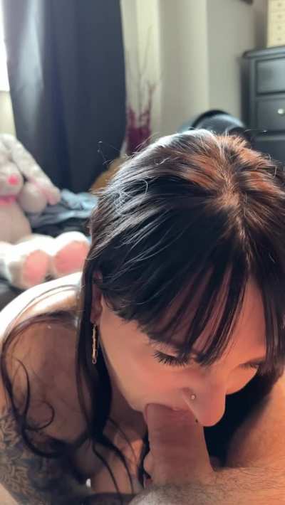 Struggling to fit it in her mouth