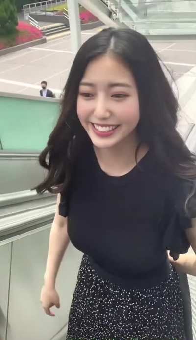 Pretty escalator girl