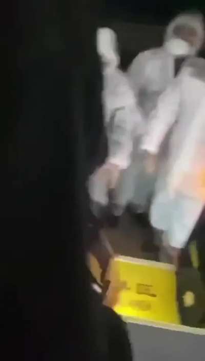Positively tested Shanghai residents are shoved and kicked onto buses violently by 