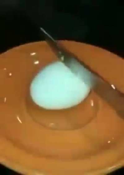 how to cut a hard boiled egg