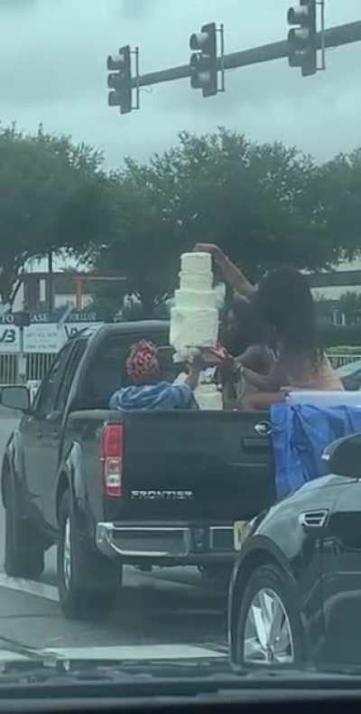 Just driving the wedding cake in the back of a pickup.