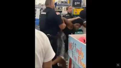 Woman tries to bite a cop
