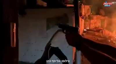 Settlers setting the neighbourhood on fire and shooting the residents with firearms