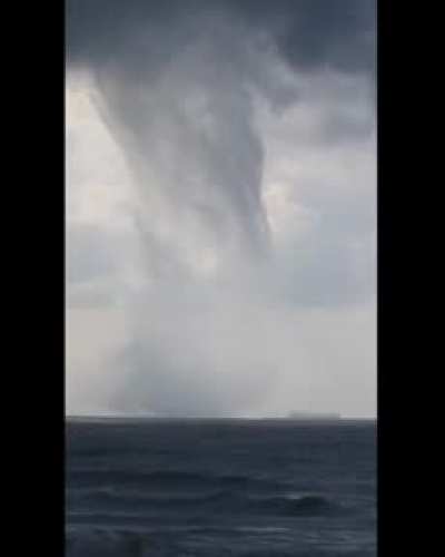 Man Captures Massive Multiple-Vortex Waterspout