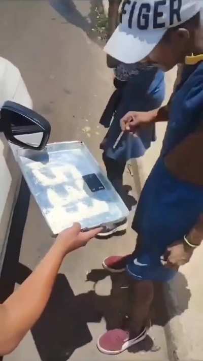 Seller distributes free samples to customers