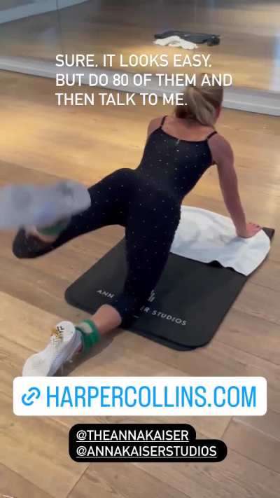 Kelly looking fit doing weighted kickbacks