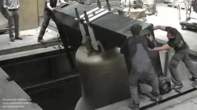 Bell ringing test at a casting pit at a bell foundry