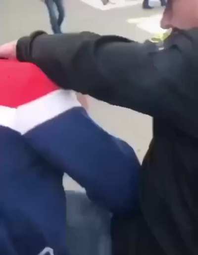 a guy keeps hitting the camera gets over sprayed
