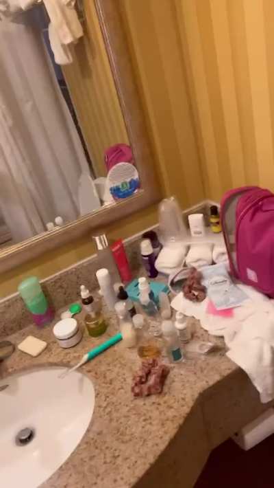 Beautiful tgirl shows off her body in the mirror