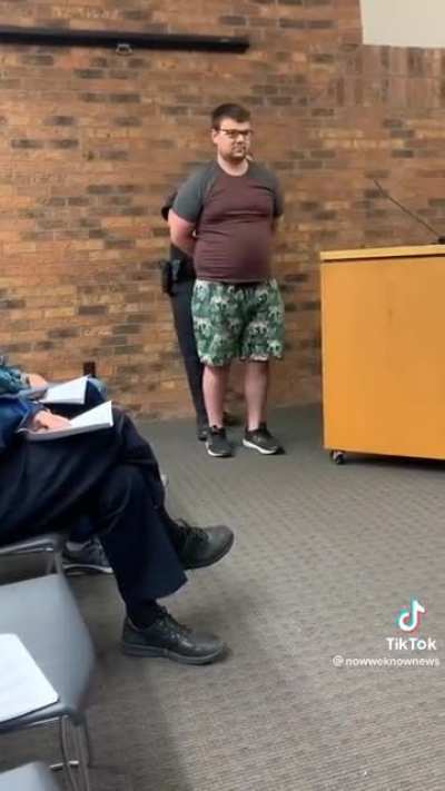 Guy is arrested at a city council meeting open to the public because they didnt like what he had to say about police involved in domestic violence in his city . violation of first amendment?