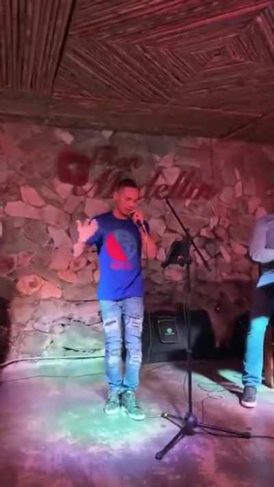 Nonito celebrating his victory over Oubaali with some karaoke