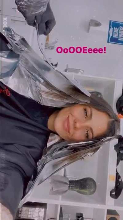 Getting her hair colored