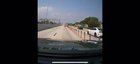 Two cars racing on a busy highway in Miami. One crashes and speeds away from the accident.