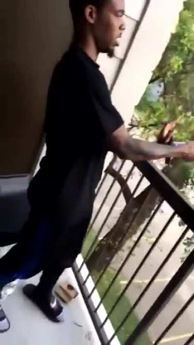 Idiot does fireworks on balcony