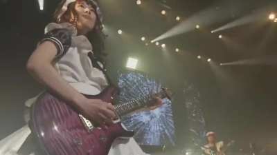 Her name is Mincho. She plays guitar. Enough said. P.4