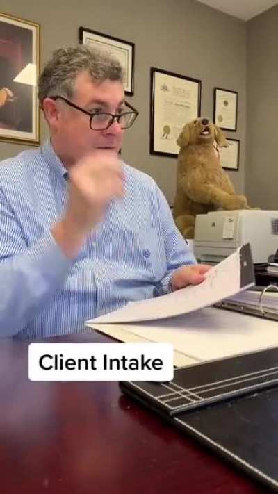 Defense lawyer doing an intake interview with his new client