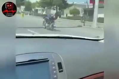 Idiot engages in distracted driving. The results are as you'd expect