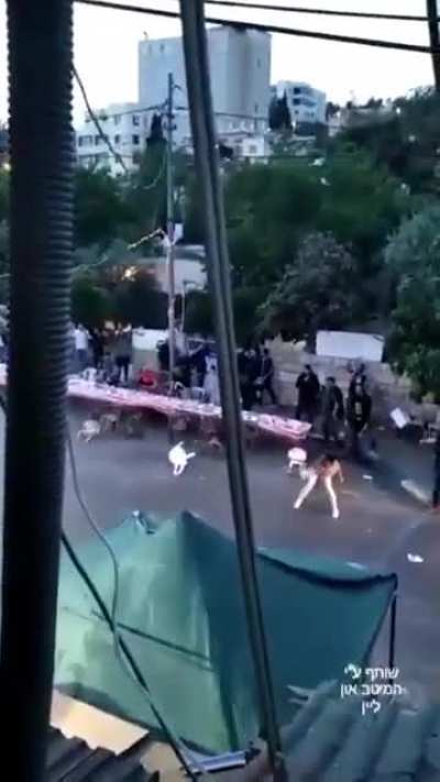 Watch: How Zionist settlers whom have stolen the house of Mariam Al Ghawi, triggered Muslims while having Iftar in front od the house, that have started clashes between Palestinians & Zionist settler terrorists