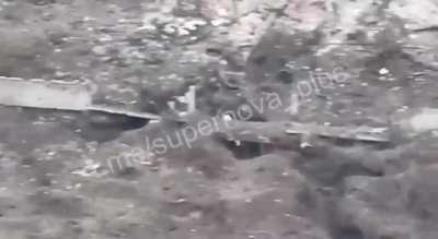 Russain soldier moves in a thermal blanket cloak to avoid being seen by thermal imager