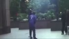 Cameraman tries to film a fight but is threatened by a large woman. Gets saved by his friend at the last minute.