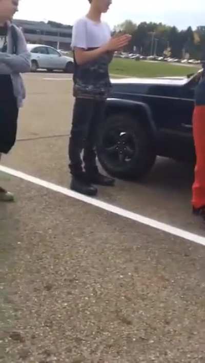 Racist bully gets kicked in the face through glass window
