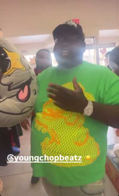 Young Chop at the Glo Gang shop in LA today