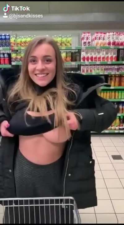 Girl Shows Her Tits On TikTok, In Broad Day, At A Public Supermarket.