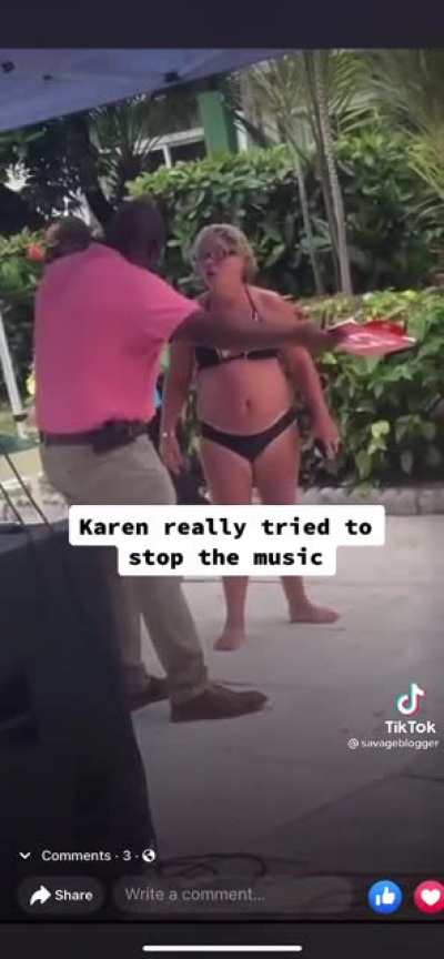 Karen tries to stop the music at a vacation resort