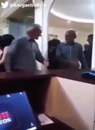 Drunk Man Fighting With His Reflection In the Mirror
