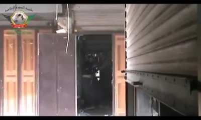 Very lucky FSA fighter survives crossing the street under heavy fire. Al-Jdayde, Aleppo Syria. 2-14-2013.