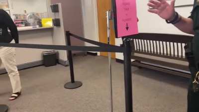 Anti-maskers harass a couple trying to get their marriage license