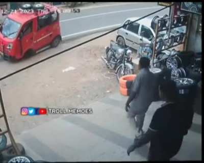 Tire came out of van in front of the repairing shop